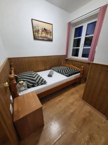 Postel nebo postele na pokoji v ubytování Pension Pod Lipou