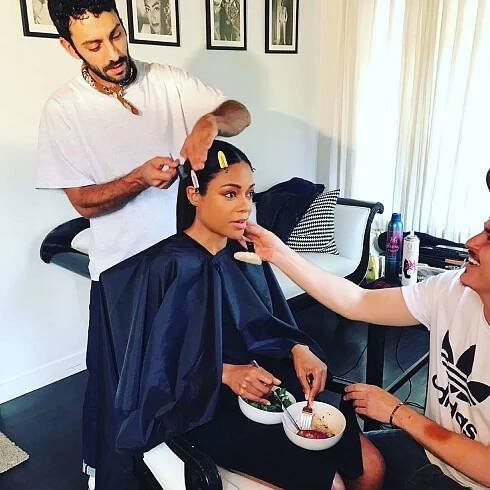 Naomie Harris eating while getting ready