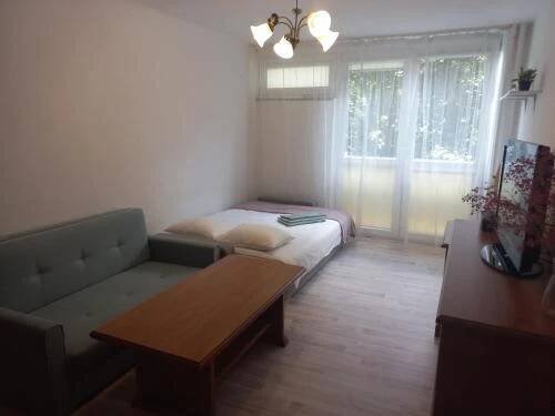 Postel nebo postele na pokoji v ubytování Квартира Warszawa