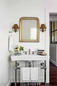Gold Mirror in White Bathroom