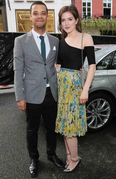 Raleigh Ritchie and Aisling Loftus arrive in an Audi at the GLAMOUR Women of the Year Awards 2016 in Berkeley Square Gardens on June 7, 2016 London, England. 