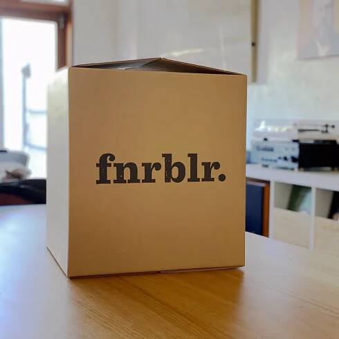 Shipping box with old FNRBLR branding