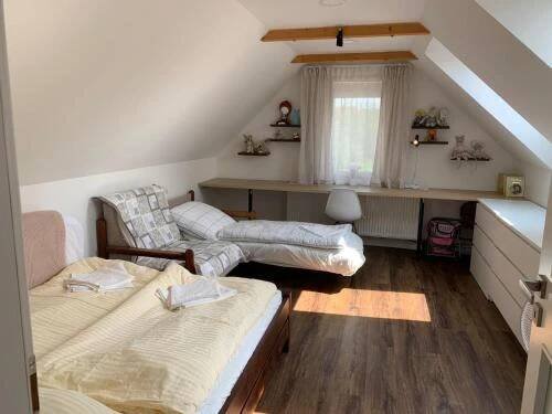Postel nebo postele na pokoji v ubytování House Big Win Mělník