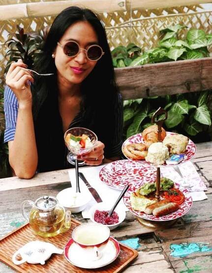 Happy Salma with foods Photo