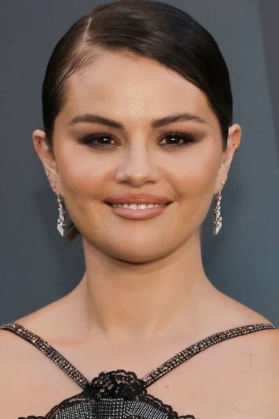 Selena Gomez's Wavy Bob Is as Sweet as Her Little White Dress—See the Photos