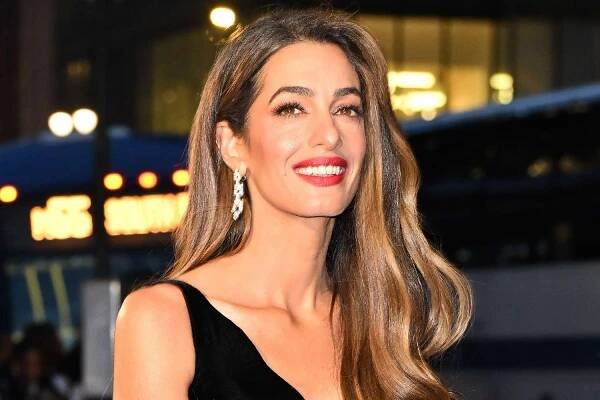 Amal Clooney Accessorizes Her Structured Skirt Suit with Barrister's Wig as She's Honored as Part of Vogue 25