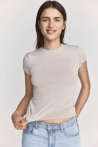 Zobraziť väčší obrázok: Priliehavé tričko - Svetlá sivobéžová - ŽENY | H&M SK 1