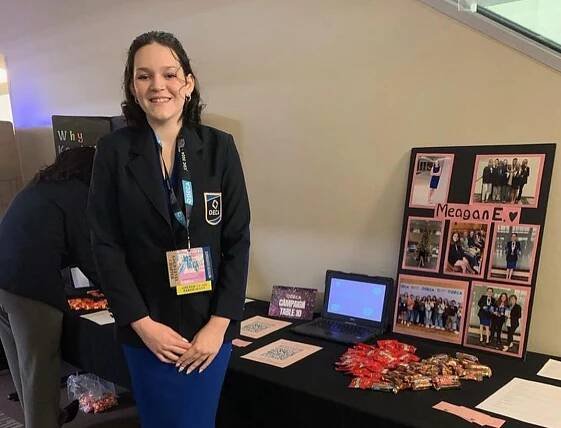 Megan Edwards receives the title of DECA Vice President.
