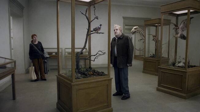 'A Pigeon Sat on a Branch Reflecting on Existence' Review: Roy Andersson's Delightful Trilogy Capper