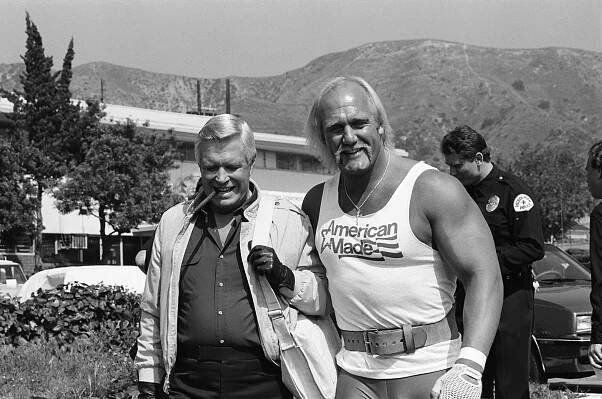 Black and white photo of George Peppard and Hulk Hogan on the set of *The A-Team*.