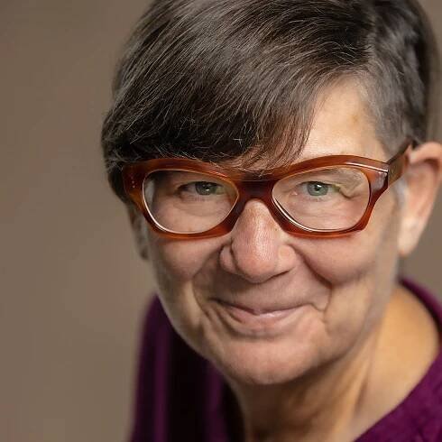 Headshot of Kathy Anderson smiling.