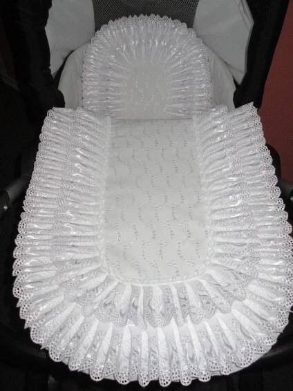 a crib that has been made out of plastic bottles and is sitting in a chair