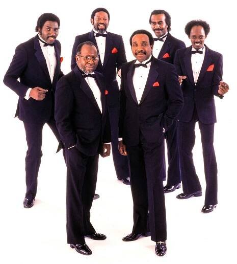 American music group, the Impressions, including Curtis Mayfield (1942 - 1999) (fore left) and Jerry Butler (fore right), 1983