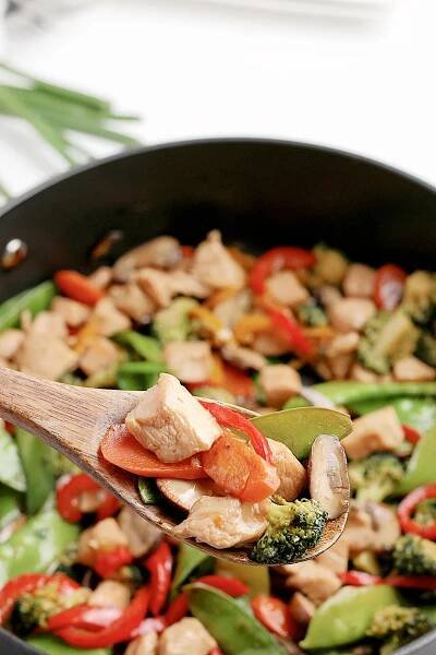 Chicken Stir Fry on wooden spoon
