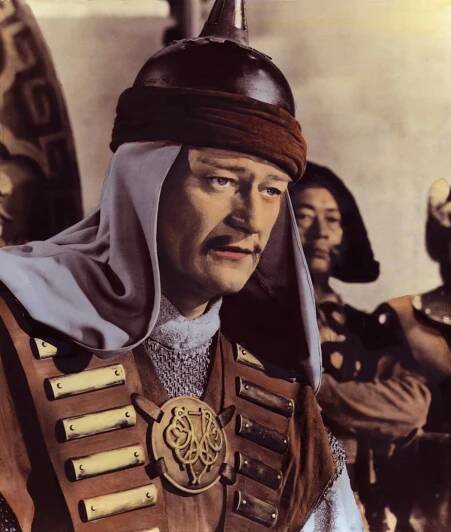 JOHN WAYNE IN 'THE CONQUERER' – Imagine stepping into John Wayne's boots for a moment. You’re on the verge of turning 50, having already done it all: starred in iconic films like 'Stagecoach' and 'The Searchers,' earned a few Oscars, bought a sprawling mansion in the Hollywood Hills, and helmed Hollywood’s leading conservative actors’ association. Life is good. Then, a trusted producer, Howard Hughes — an industry heavyweight, not some fly-by-night dreamer — approaches you with a bold proposal: play Genghis Khan, the legendary nomadic warrior of the Eurasian steppe.

Sure, you’ve never heard of him, but Hughes assures you that Khan was a monumental historical figure, a hero of the Mongols—