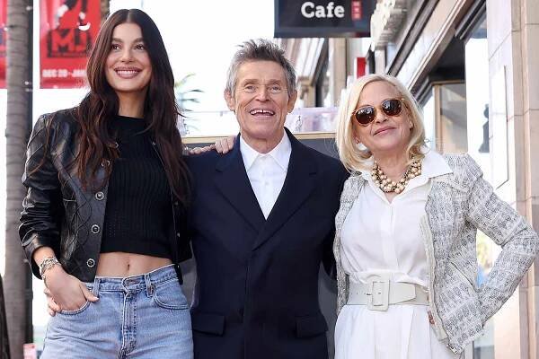 Camila Morrone, Willem Dafoe and Patricia Arquette attend the Hollywood Walk of Fame Star Ceremony for Willem Dafoe on January 08, 2024 in Hollywood, California. 