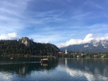 Reflection of Bled Castle in Lake Bled