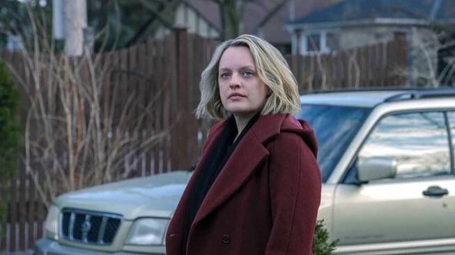 Elizabeth Moss in a coat in The Handmaid's Tale