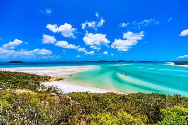 Beach and turquoise sea at Whitsunday Islands off the central coast of Queensland, Australia