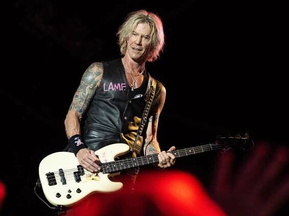 Duff McKagan with his bass guitar on stage at Glastonbury.