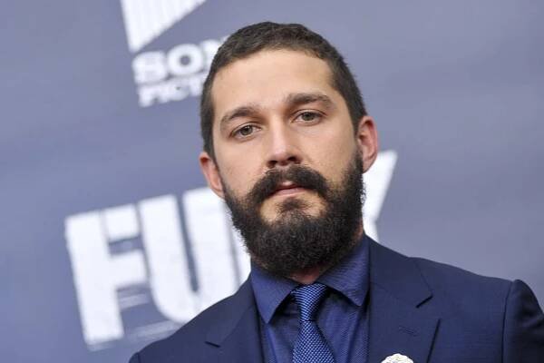 Shia LaBeouf poses for photographers on the red carpet during the 