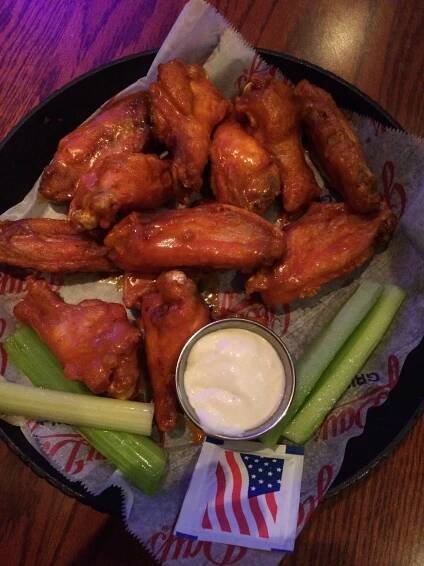 Buffalo Chicken Wings with Celery and Blue Cheese Dressing