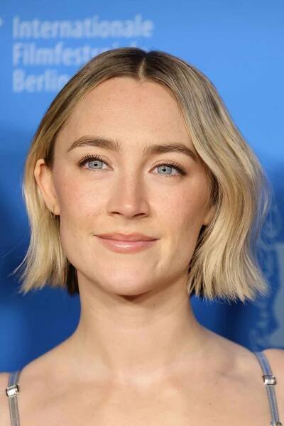 Saoirse Ronan blonde bob with textured waves and center part