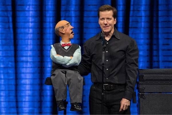 Comedian-ventriloquist Jeff Dunham and his puppet Walter perform together onstage.