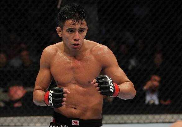 Miguel Torres, The Former WEC Bantamweight Champion In Action Wallpaper