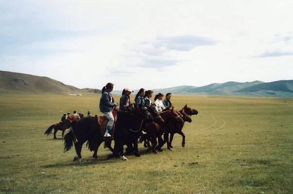 Just as they would have centuries ago, young Mongolian girls still learn to ride horses as toddlers today.