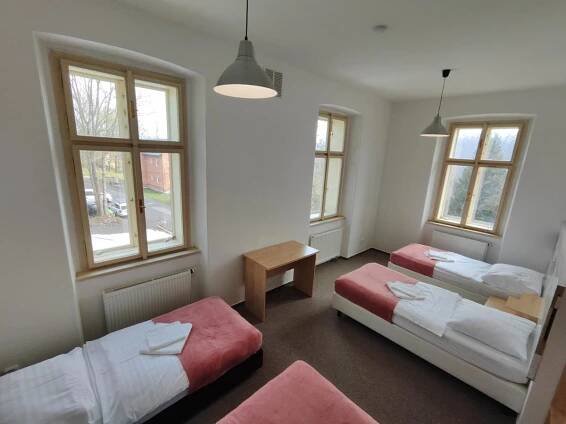 Posteľ alebo postele v izbe v ubytovaní Hotel Stará Škola