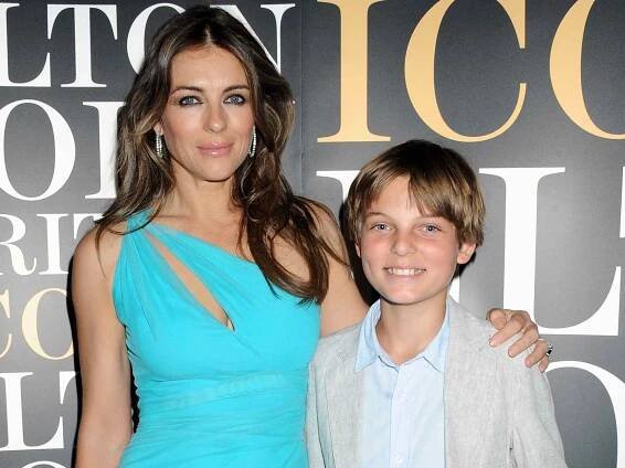 Elizabeth Hurley (L) and son Damian attend as Sir Elton John is awarded the first annual 'BRITS Icon' award