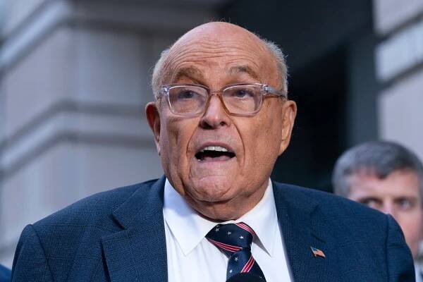 Giuliani gets to keep apartments, World Series rings in settlement with election workers - ABC News