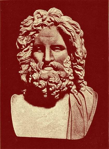 Black and white photograph of a bust of Zeus, with beard at the Vatican in Rome.