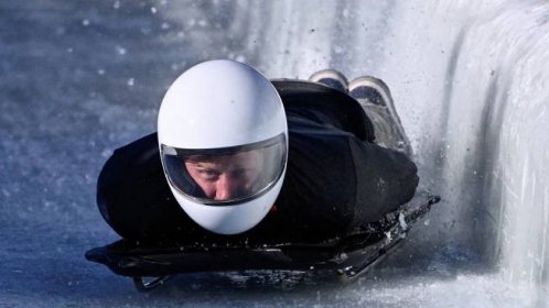 Prince Harry races head-first down a skeleton track at 61.5mph