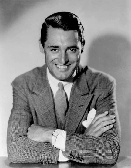 Cary Grant With Collar Pin Reverso And Glencheck Suit