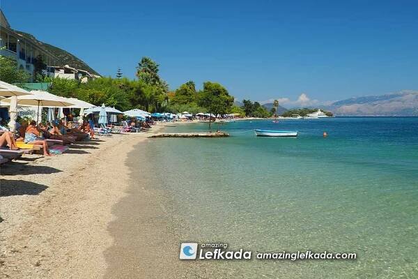 Paralia Nidri beach sunbeds and shallow child friendly sea