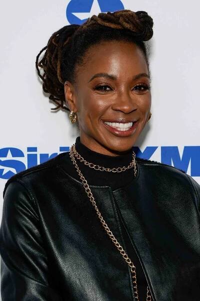 Shanola Hampton wearing an updo loc'd pompadour