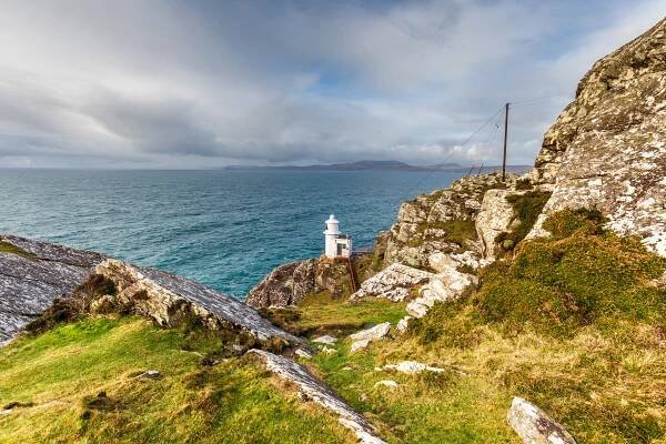 Coastal Lighthouse on Rocky Cliffside