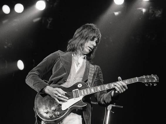 Jeff Beck performing on stage with his Gibson Les Paul