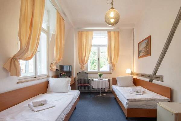 Postel nebo postele na pokoji v ubytování Villa Dagmar