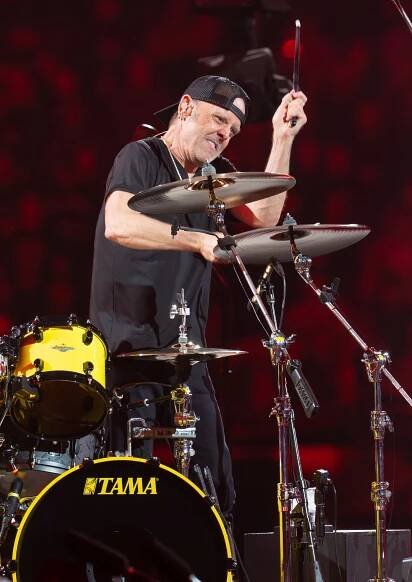 Lars Ulrich of Metallica performing at a concert.