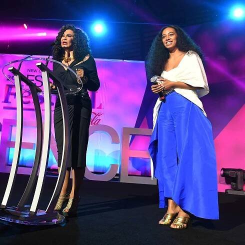 Tina Knowles Lawson (L) and Solange Knowles (R) on stage at the 2016 ESSENCE Festival Presented By Coca-Cola at Ernest N. Morial Convention Center on July 3, 2016 in New Orleans, Louisiana.