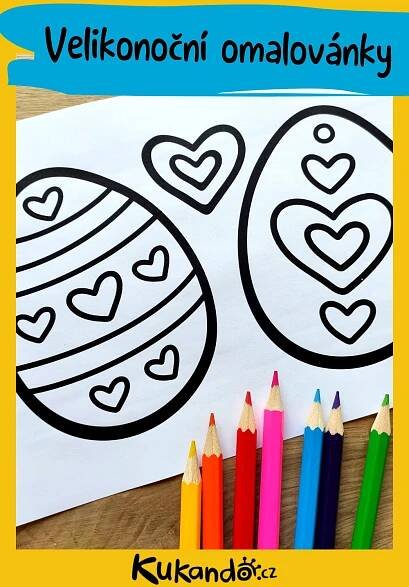an easter egg and two hearts on a sheet of paper with colored pencils next to it