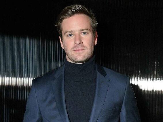Armie Hammer poses for a photo at BOSS Menswear - Front Row at New York Fashion Week Mens' on February 7, 2018 in New York City.