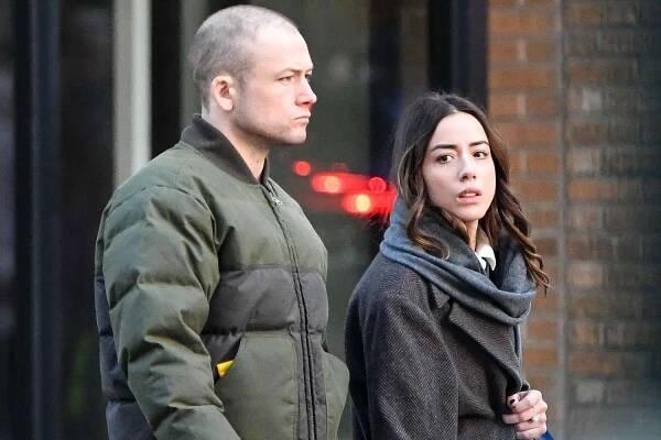 Taron Egerton Holds Hands with Chloe Bennet as They Step Out Together in New York City