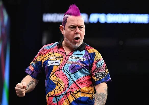 Peter Wright celebrating a darts victory.