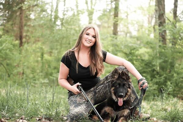 girl dog gun