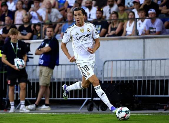INNSBRUCK, AUSTRIA - AUGUST 12: Alvaro Carreras of Real Madrid controls the ball during the pre-season friendly match between WSG Tirol and Real Madrid CF at Tivoli Stadion Tirol on August 12, 2025 in Innsbruck, Austria. (Photo by Jan Hetfleisch/Getty Images)