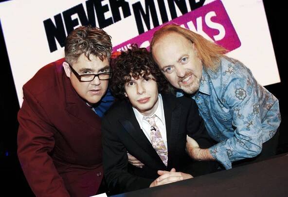 Phill Jupitus, Simon Amstell, and Bill Bailey posing for BBC Two's 'Never Mind The Buzzcocks'.
